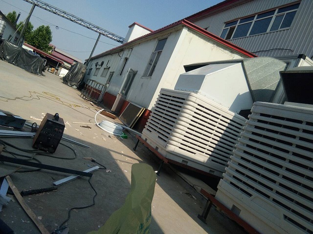 高效冷風(fēng)機(jī)，濕簾風(fēng)機(jī)，負(fù)壓風(fēng)機(jī)降溫哪種好